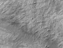 This image from NASA's Mars Global Surveyor shows a field of boulders on the surface of a landslide deposit in Ganges Chasma. Ganges Chasma is one of the valleys in the Valles Marineris canyon system on Mars.