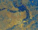 This is an image from NASA's Spaceborne Imaging Radar C/X-Band Synthetic Aperture Radar of St. Louis, Missouri, where the Mississippi and Missouri Rivers come together. St. Louis is the bright gold area within a bend in the Mississippi River.
