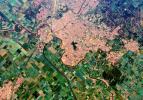 This is a spaceborne radar image from NASA's Spaceborne Imaging Radar C/X-Band Synthetic Aperture Radar of the city of Sacramento, the capital of California. Urban areas appear pink and the surrounding agricultural areas are green and blue.