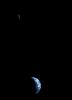 This picture of a crescent-shaped Earth and Moon -- the first of its kind ever taken by a spacecraft -- was recorded Sept. 18, 1977, by NASA's Voyager 1 when it was 7.25 million miles (11.66 million kilometers) from Earth.