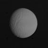 The heavily cratered surface of Tethys was photographed at l:35 a.m. PST on November 12 from a distance of l.2 million kilometers (750,000 miles) NASA's by Voyager l.