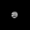 This image of Neptune was taken through the clear filter of the narrow-angle camera on July 16, 1989 by NASA's Voyager 2 spacecraft. The image was processed by computer to show the newly resolved dark oval feature embedded in the middle of the dusky south