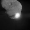 When NASA's Deep Impact probe collided with Tempel 1, a bright, small flash was created, which rapidly expanded above the surface of the comet. This flash lasted for more than a second.