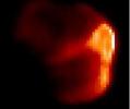 This image composite shows comet Tempel 1 in infrared light . The infrared picture highlights the warm, or sunlit, side of the comet, where NASA's Deep Impact probe later hit.