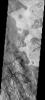 This image of part of Aram Chaos on Mars shows two different surface textures with distinctly different brightnesses. The lighter layer appears to be on top (therefore younger) than the darker surface as seen by NASA's 2001 Mars Odyssey.