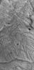 NASA's Mars Global Surveyor shows a portion of a large landslide deposit on the floor of western Tithonium Chasma on Mars.