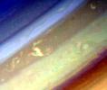 This image of the northern hemisphere of Saturn was taken by NASA's Voyager 1 on Nov. 5, 1980 at a range of 9 million kilometers (5.5 million miles) shows a variety of features in Saturn's clouds.