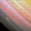 This false color image from NASA's Voyager 1, taken on November 6, 1980 from a distance of about 8 million kilometers, shows somewhat similar, although much smaller, red spot on Saturn.