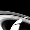 The crescent of Saturn, the planet's rings and their shadows are seen in this NASA Voyager 1 image taken Nov. 13, 1980 at a distance of 1,500,000 kilometers (930,000 miles) as the spacecraft began to leave the Saturn system.
