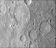 As NASA's Mariner 10 approached Mercury at nearly seven miles per second on March 29, 1974, its TV camera took this picture from an altitude of 35,000 kilometers (21,700 miles) The picture shows a heavily-cratered surface with many low hills.