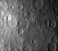 NASA's Mariner 10 took this picture some 2 1/2 hours before it passed Mercury on March 29, 1974. The bright-floored crater is the center of a very large bright area which could be seen in pictures from more than two million miles distant