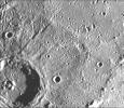This image, from NASA's Mariner 10 spacecraft which launched in 1974, shows a crater just north of the Caloris Planitia displays interior and central peaks rising up from a hilly floor.
