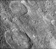 The craters in this image NASA's Mariner 10 spacecraft, which launched in 1974, have interior rings of mountains and ejecta deposits which are scarred by deep secondary crater chain groves. 