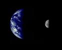 The Earth and Moon were imaged by NASA's Mariner 10, launched on November 3, 1973, from 2.6 million km while completing the first ever Earth-Moon encounter by a spacecraft capable of returning high resolution digital color image data.