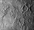 This image, from NASA's Mariner 10 spacecraft which launched in 1974, shows hilly and lineated terrain and a patch of smooth plains in a large degraded crater.