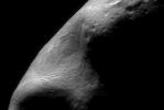 This picture was taken from NASA's NEAR Shoemaker spacecraft on Feb 15, 2000, while the spacecraft was passing directly over the large gouge that creates Eros's characteristic peanut shape.