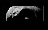 This image of asteroid 253 Mathilde was returned by NASA's NEAR Shoemaker spacecraft in 1997. Raised crater rims suggest that some of the material ejected from these craters traveled only short distances before falling back to the surface.