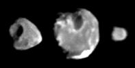 These images of the inner Jovian moons Thebe, Amalthea, and Metis (left to right), taken in January 2000 by the camera onboard NASA's Galileo spacecraft, are the highest-resolution images ever obtained of these small, irregularly shaped satellites.