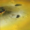 An active volcanic eruption on Jupiter's moon Io was captured in this image taken on February 22, 2000 by NASA's Galileo spacecraft. Tvashtar Catena, a chain of giant volcanic calderas, where an energetic eruption caught in action in November 1999.
