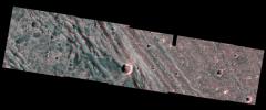 The boundary between the bright terrain of Harpagia Sulcus and dark terrain of Nicholson Regio areas of Jupiter's moon Ganymede springs out when viewed through red/blue 3-D glasses, in this image taken by NASA's Galileo spacecraft as it flew by Ganymede.