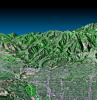 This perspective view, acquired by NASA's Shuttle Radar Topography Mission in Feb. 2000, shows the western part of the city of Pasadena, California, looking north towards the San Gabriel Mountains.