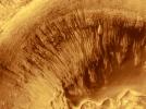 NASA's Mars Global Surveyor shows Newton Crater, a large basin on Mars formed by an asteroid impact that probably occurred more than 3 billion years ago.