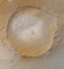 NASA's Mars Global Surveyor shows frosted craters of northern spring and southern autumn in an unnamed crater on Mars.