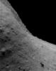 This image of asteroid Eros, taken by NASA's NEAR Shoemaker on July 22, 2000, shows the relatively gentle topography of the area really lies on a steep cliff.