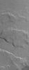 NASA's Mars Global Surveyor shows several overlapping lava flows located on the vast plains east of the volcano, Ascraeus Mons on Mars. Hundreds of lava flows cover the plains from Ascraeus Mons eastward to Kasei Valles. 