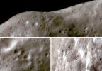These images of asteroid Eros, taken by NASA's NEAR Shoemaker on Oct. 16, 2001, show surface materials darkened and reddened by solar wind and micrometeorite impacts appearing pale brown; fresher materials on steep slopes appear in bright whites or blues.