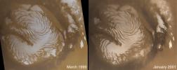 NASA's Mars Global Surveyor shows light-toned surfaces of residual water ice in summer on Mars' north polar cap.