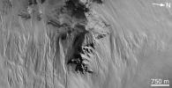 NASA's Mars Global Surveyor shows gullies on the pit walls of the Noachian Highlands on Mars.