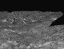 This perspective view, simulating a low altitude flight over the surface of Ganymede, was made possible by topographic analysis of stereo images of the Sippar Sulcus region. Such a view was made possible when NASA's Galileo spacecraft passed Ganymede.