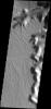 At the southern end of Echus Cansma on Mars this dissected surface and mega-gullies occur as seen by NASA's 2001 Mars Odyssey spacecraft.