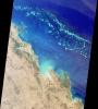 The Great Barrier Reef extends for 2,000 kilometers along the northeastern coast of Australia. It is not a single reef, but a vast maze of reefs, passages, and coral cays (islands that are part of the reef).