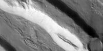 This visible-light image, taken by the thermal emission imaging system's camera on NASA's Mars Odyssey spacecraft, shows the highly fractured, faulted and deformed Acheron Fossae region of Mars.