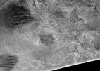 Synthetic aperture radar images obtained from NASA's Cassini spacecraft in February 2005 show that Titan's surface is modified by fluid flows and wind-driven deposits.