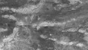 This synthetic aperture radar image of Titan was taken on Oct. 28, 2005, as NASA's Cassini spacecraft flew by at a distance of 1,350 kilometers (840 miles).