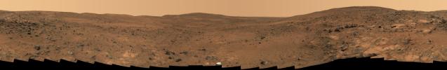 In late November 2005 while descending 'Husband Hill,' NASA's Mars Exploration Rover Spirit took the most detailed panorama so far of the 'Inner Basin,' the rover's next target destination. An abundance of rocks upon red soil is shown.