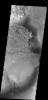 This interesting deposit is located on the floor of Becquerel Crater on Mars as seen by NASA's 2001 Mars Odyssey spacecraft.