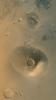 NASA's Mars Global Surveyor shows the martian volcanoes, Ceraunius Tholus (lower) and Uranius Tholus (upper). The presence of impact craters on these volcanoes, particularly on Uranius Tholus indicates that they are quite ancient and are not active today