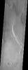 This image from NASA's Mars Odyssey shows a Martian geologic deposit known as the Medusae Fossae Formation (the raised plateau in the upper two-thirds of the image), a soft, easily eroded deposit that extends for nearly 1,000 km along the equator of Mars.
