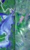 These images show dramatic change in the water at Dongting Lake in Hunan province, China between August and September of 2002. NASA's Terra satellite captured this image on September 2, 2002 and March 19, 2002.
