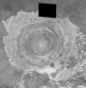 This image from NASA's Mars Global Surveyor shows a circular feature in northern Terra Meridiani on Mars.