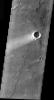 This image from NASA's Mars Odyssey spacecraft shows windstreaks features caused by the interaction of wind and topographic landforms. These windstreaks are located on the lava flows of Meroe Patera in Syrtis Major.