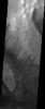 Like many of the craters in the Oxia Palus region of Mars, Trouvelot Crater, shown in this NASA Mars Odyssey image, hosts an eroded, light-toned, sedimentary deposit on its floor.