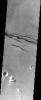 This image from NASA's Mars Odyssey spacecraft shows fractures within the volcanic plains south of Elysium Mons.