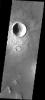 This image from NASA's Mars Odyssey shows a large crater on Mars retaining its original bowl shaped interior and the radial surface pattern on the ejecta. Just to the south is a crater that has been infilled by ejecta from the larger crater. 