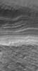 NASA's Mars Global Surveyor shows a slope upon which are exposed some of the layered materials that underlie the south polar cap of Mars.