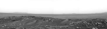 This panorama is one of the first that NASA's Spirit rover snapped upon reaching the summit of 'Husband Hill,' located in 'Columbia Hills' in Gusev Crater, Mars. Large amounts of sandy material have been blown creating rippled piles of sand.